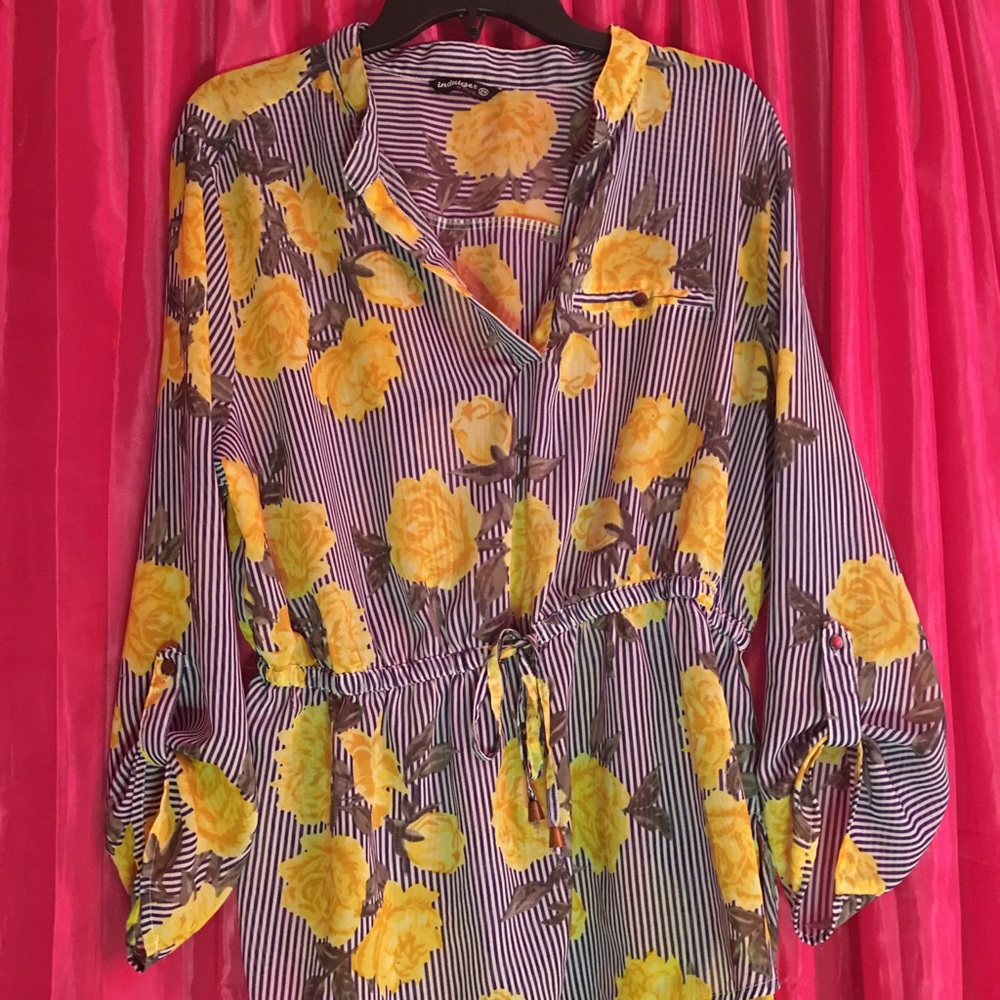 Yellow floral blouse.